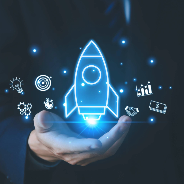 Digital rocket hologram with technology icons hovering over a businessperson’s hand, representing aerospace and defence innovation powered by precision thermal components.